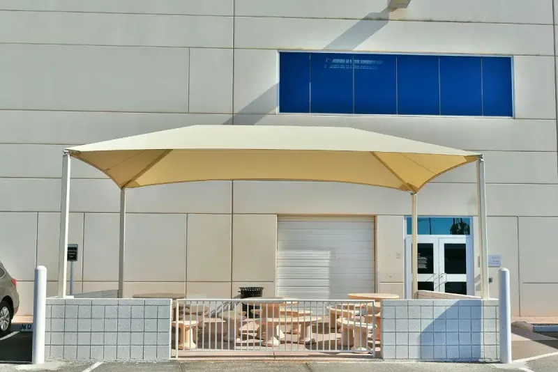 Framed hip-style shade installation in a commercial outdoor setting at American Airlines